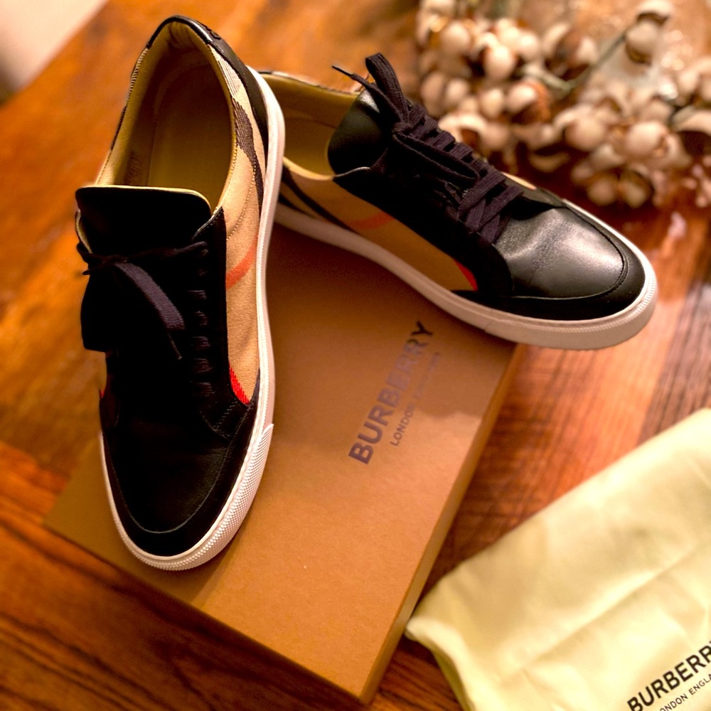 Burberry,worn once, box, dust bags and receipt included. black leather/plaid
